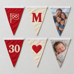 Einzelne Fähnchen der Wimpelkette: ein Logo, der Buchstabe M, ein Familienfoto, die Zahl 30, ein Herz und ein Babyfoto